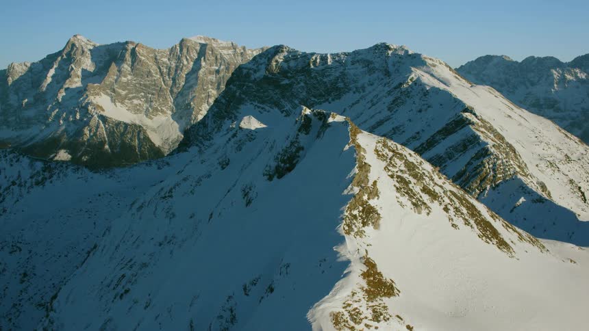 Snow covers the mountain