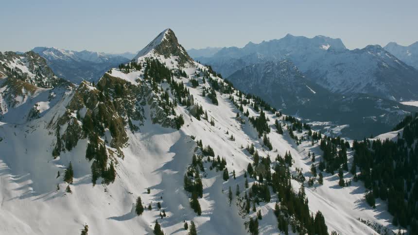 Snow covers a mountain range