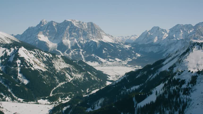 A mountain range is being flown over