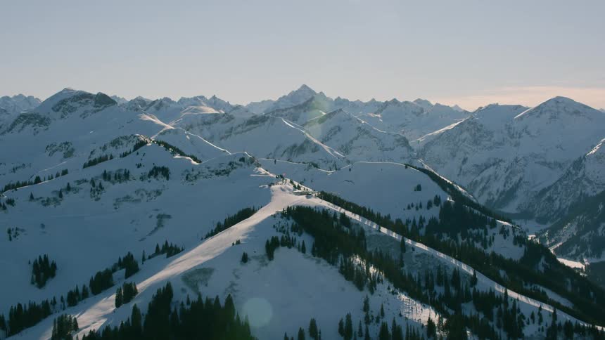 The range of mountains are covered with snow