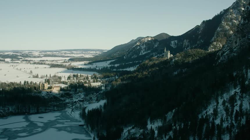 Snow covers a mountain landscape