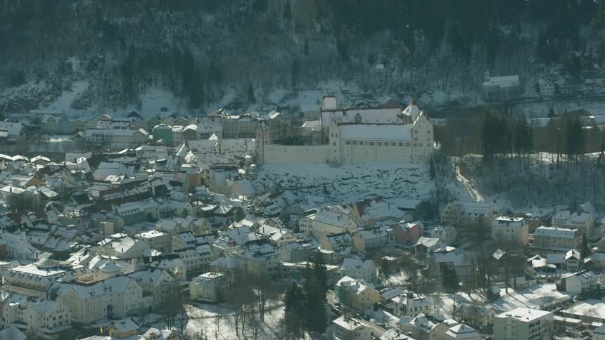 Snow covers city buildings