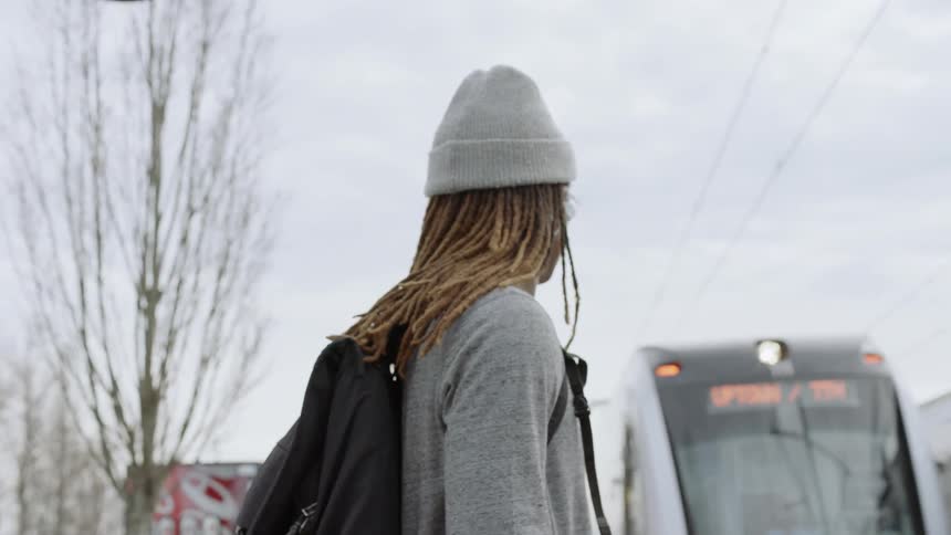 Man waits for a train