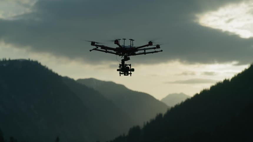A drone hovers in the sky