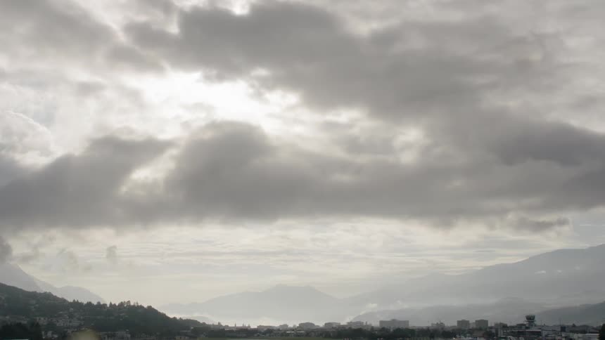 Clouds float over mountains