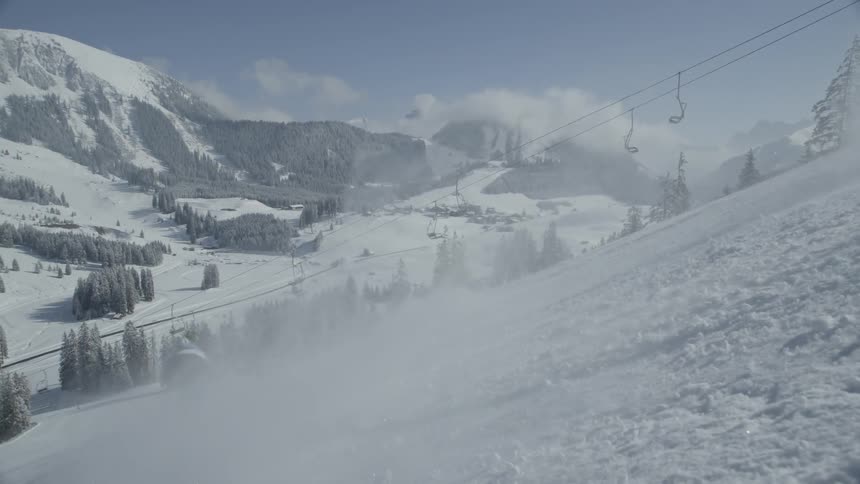 A person skis down a slope
