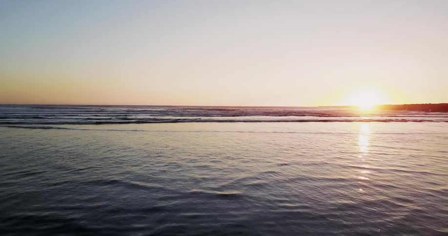 Sun setting on a quiet beach