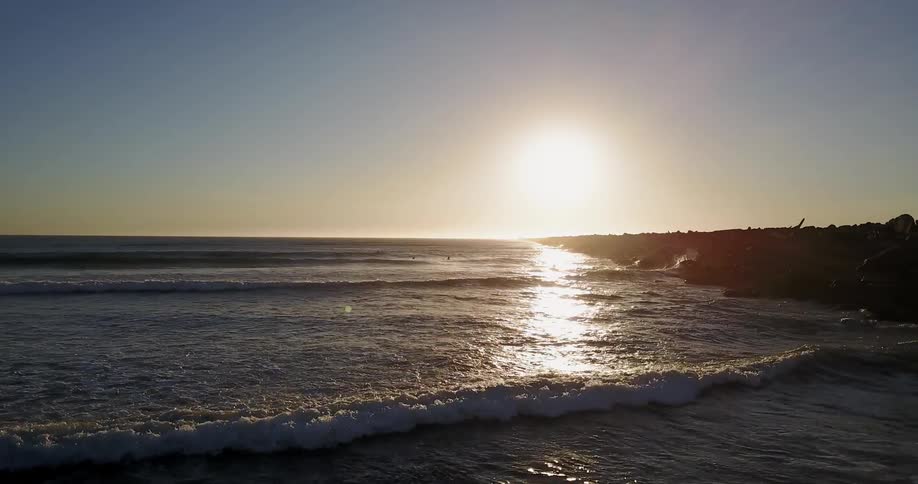 Smalls waves are crashing on the shore