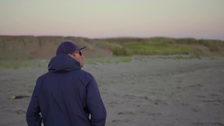 Man walking on flat dry land