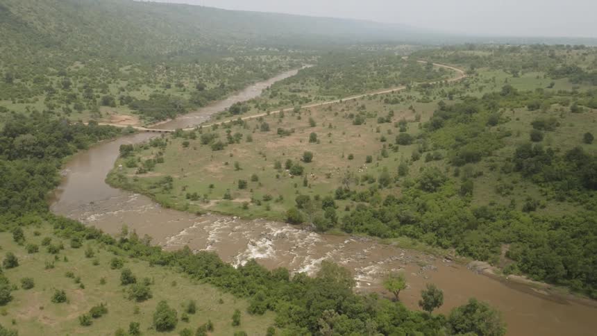 River runs through a valley floor