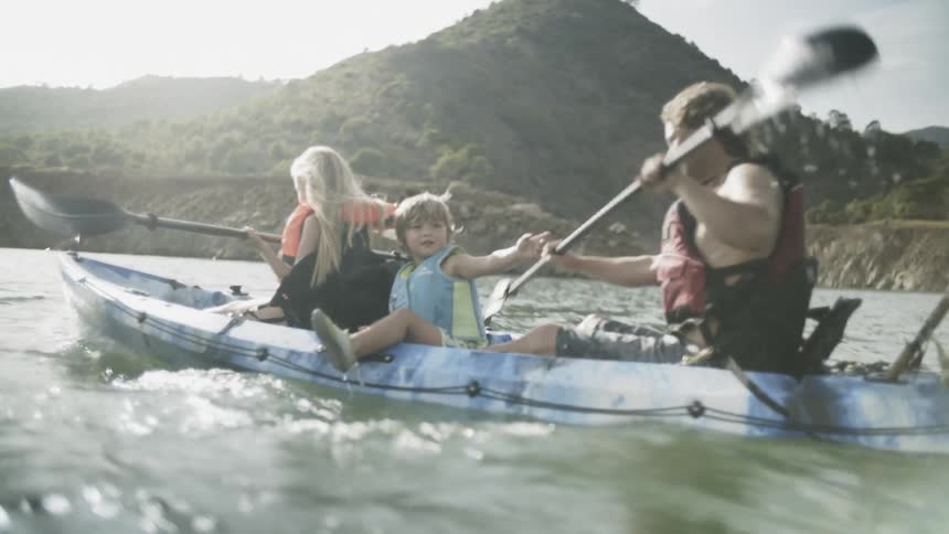 People riding a canoe