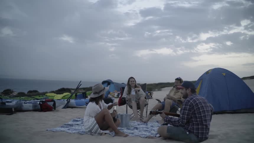 People camp on a beach