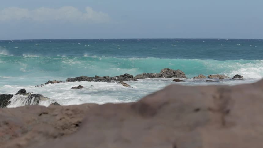 Waves crashing against rocks