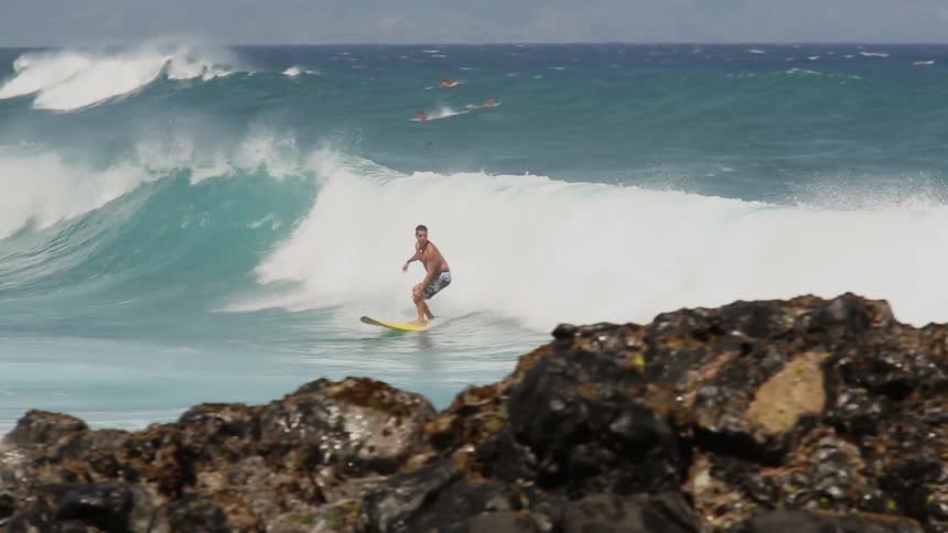 A person on a surfboard