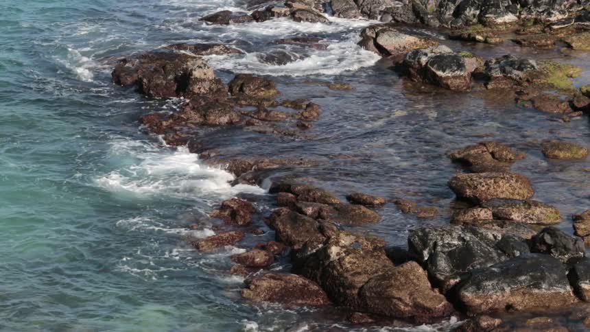 Waves crashing against rocks