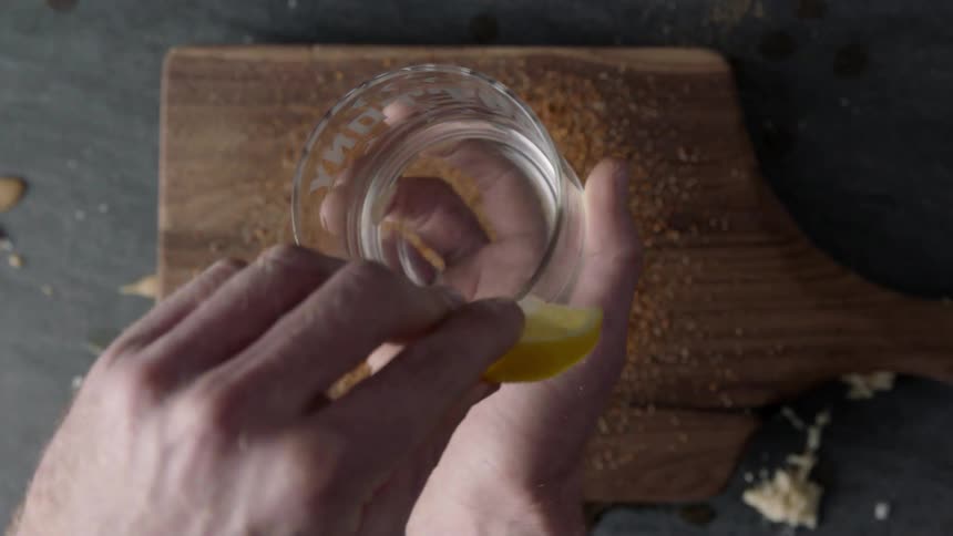 A person is preparing a drink
