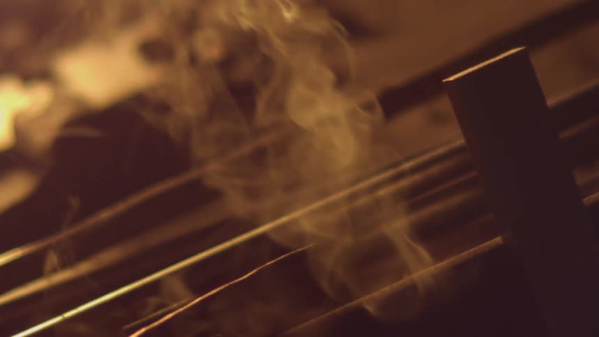 Steam rising off some rods on the ground