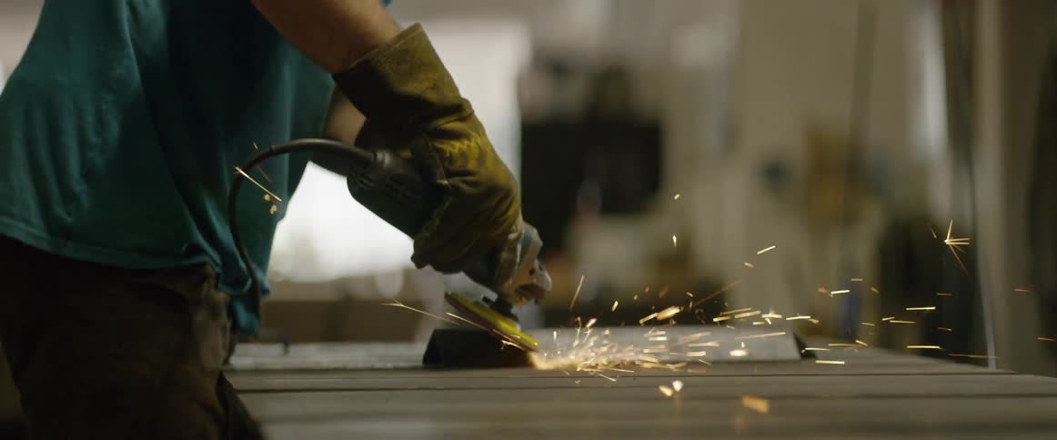 Someone is using a grinder on metal