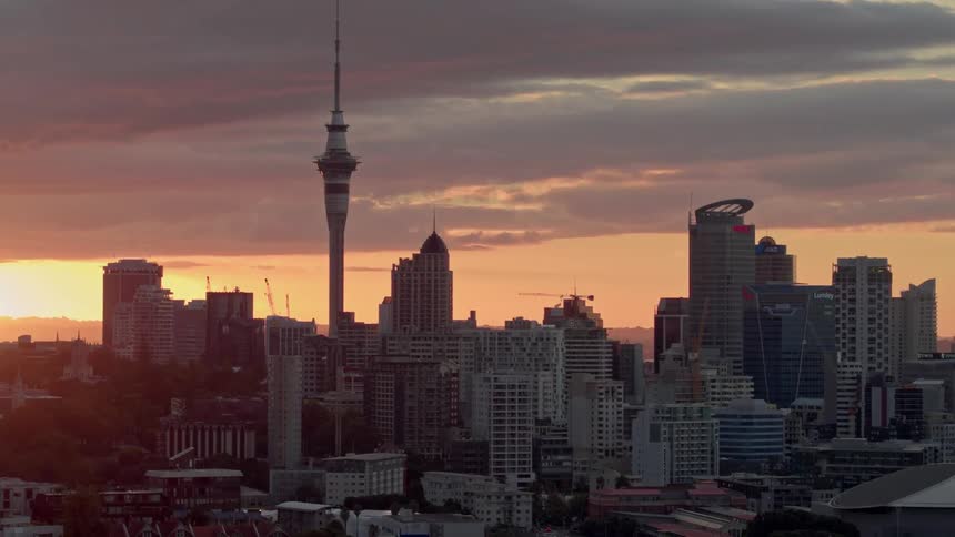 City skyline with space needle at sunset