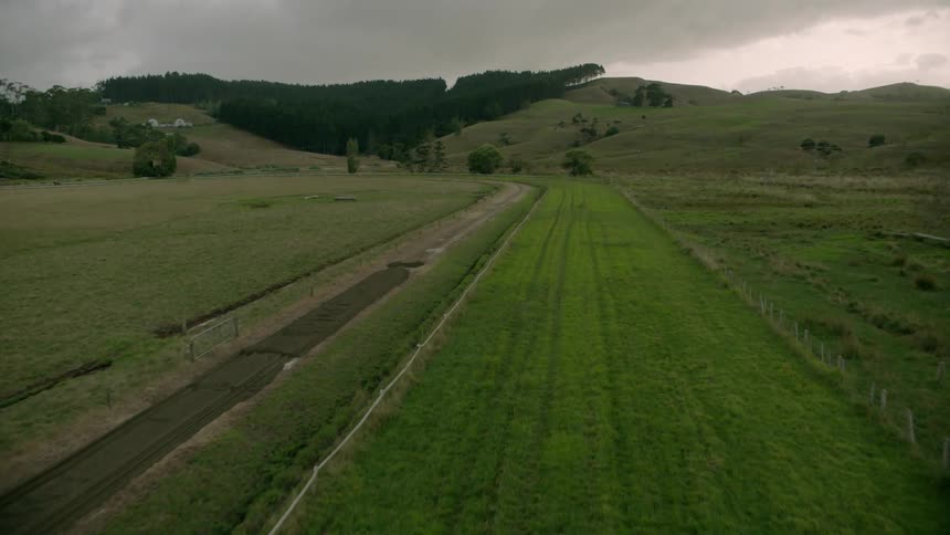 Fields extend across a valley floor