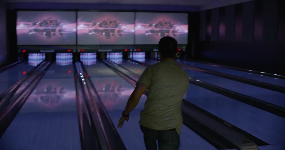A man is bowling