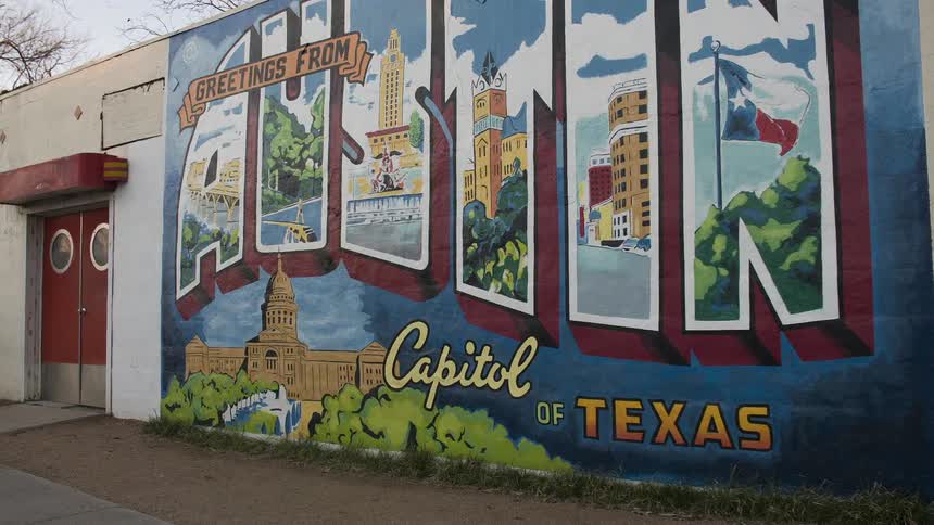 View of a building wall covered in artwork