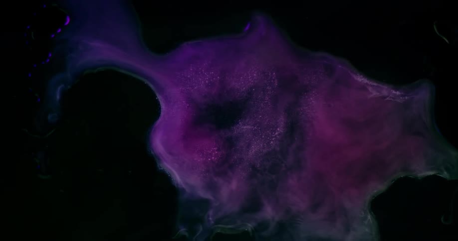 An iridescent liquid moves and pools