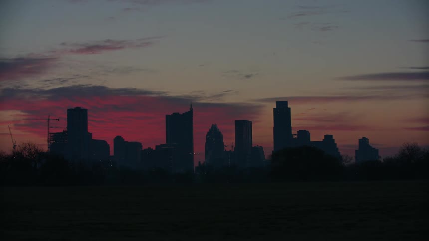 A timelapse of a city at dusk