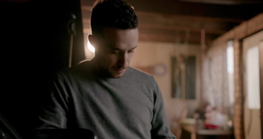 A man texts on his phone