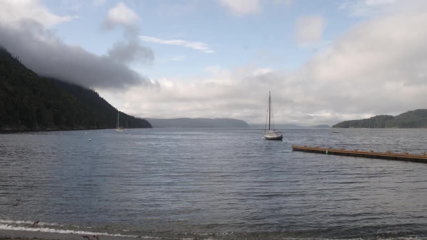 A boat sails on a lake
