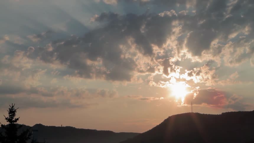 Sunset On Cloudy Evening