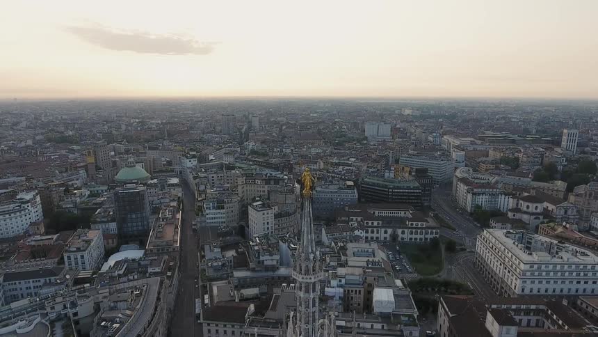 The top of the tower has a gold statue on top