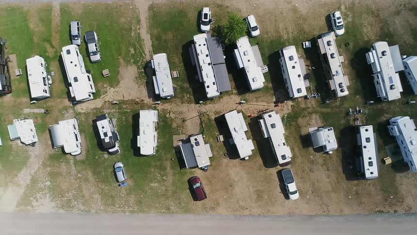 A drone is flying over a trailer park