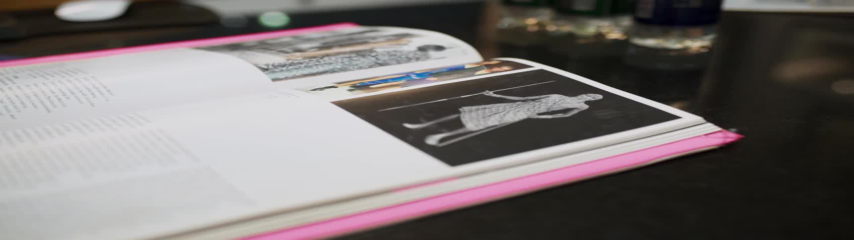 A book is open on the table