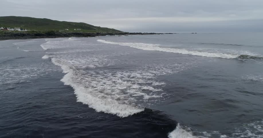Ocean waves flow towards the shore