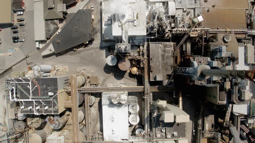 Smoke emerges from a factory