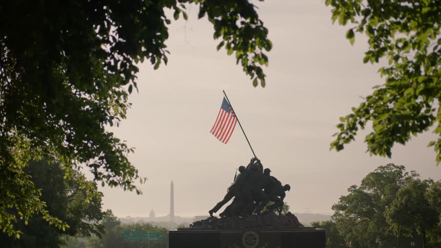 A war monument is shown from a distance