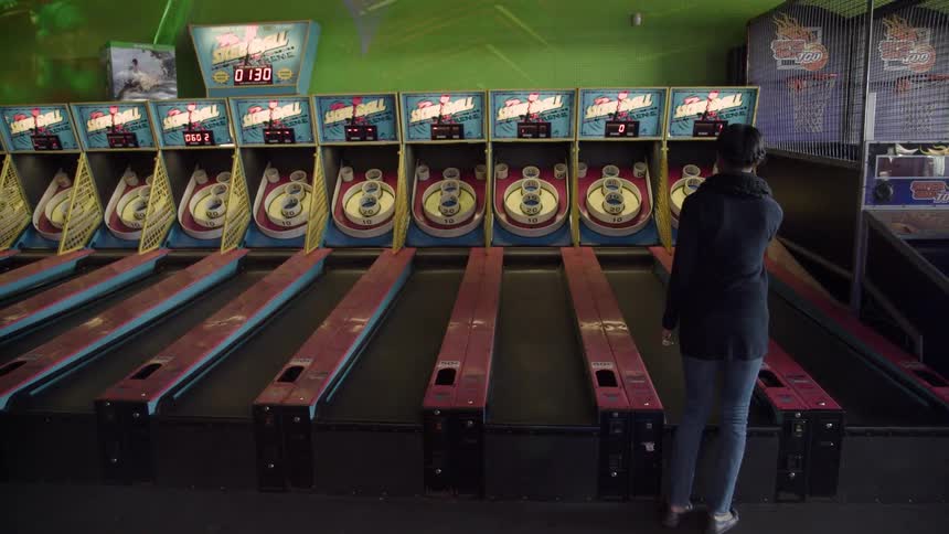 Someone is playing skeeball