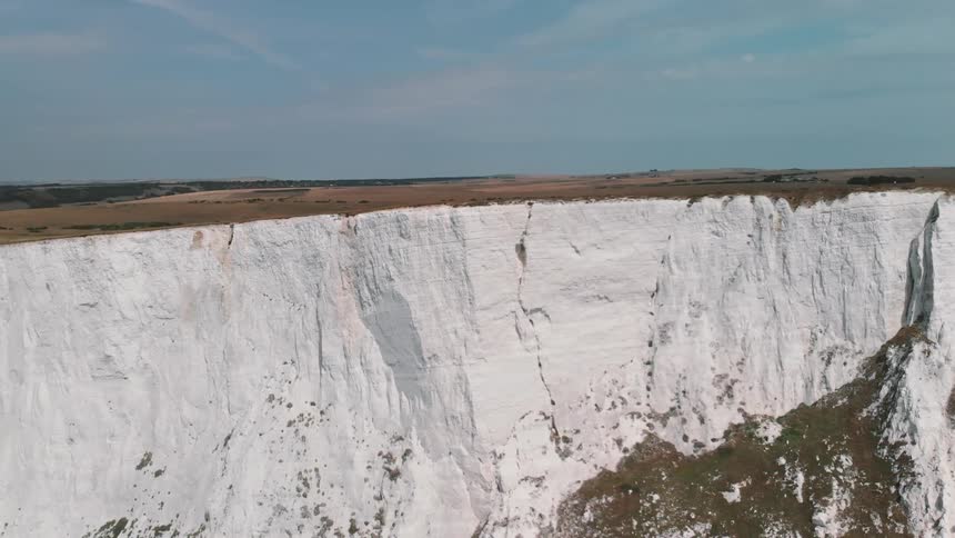 A plateau with white rock cliffs