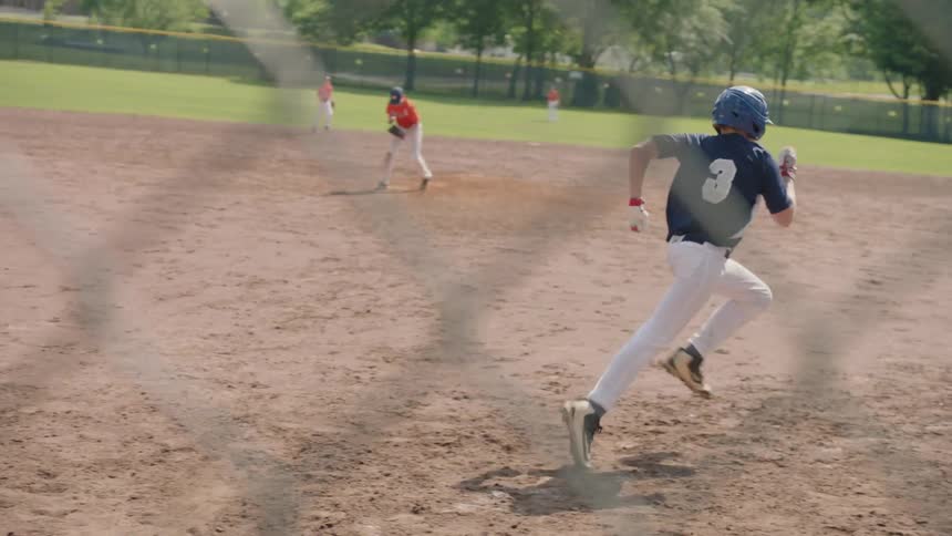 Batter connects with the baseball
