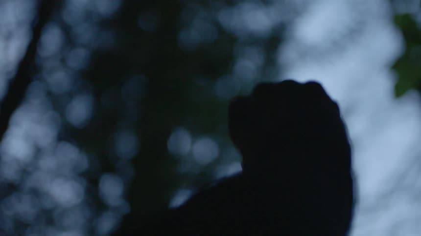 Man closes and opens his outstretched hand