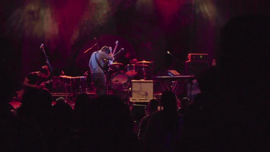 A band performs on stage at a concert