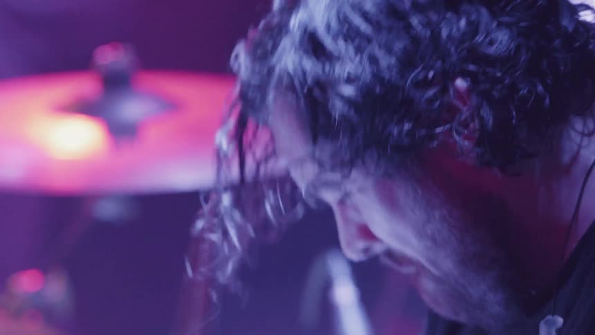 A drummer plays a song