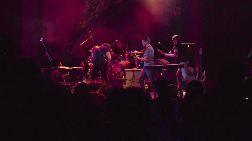 A band is playing on stage