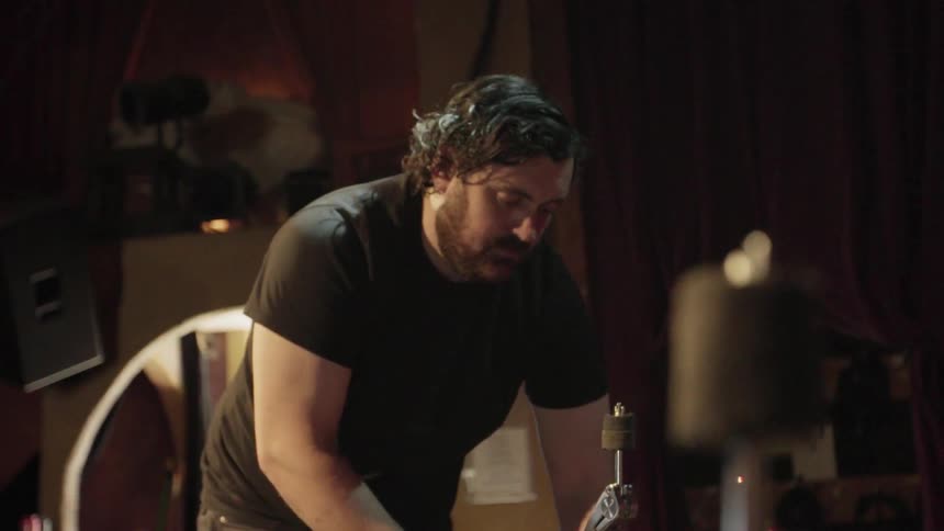 Man fixes drum pedal