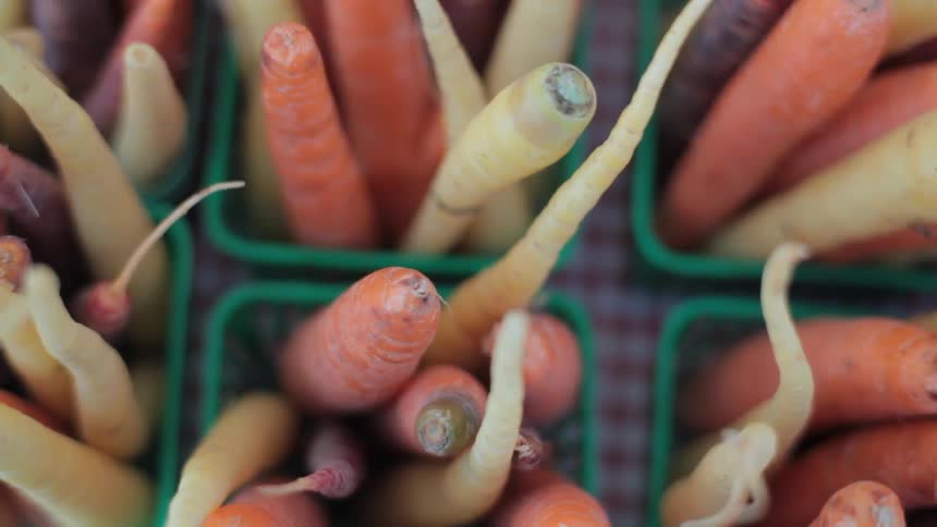 Carrots in small plastic boxes