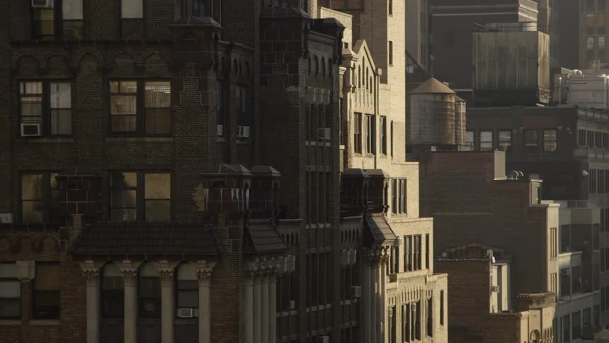 View of some tall buildings partially shaded