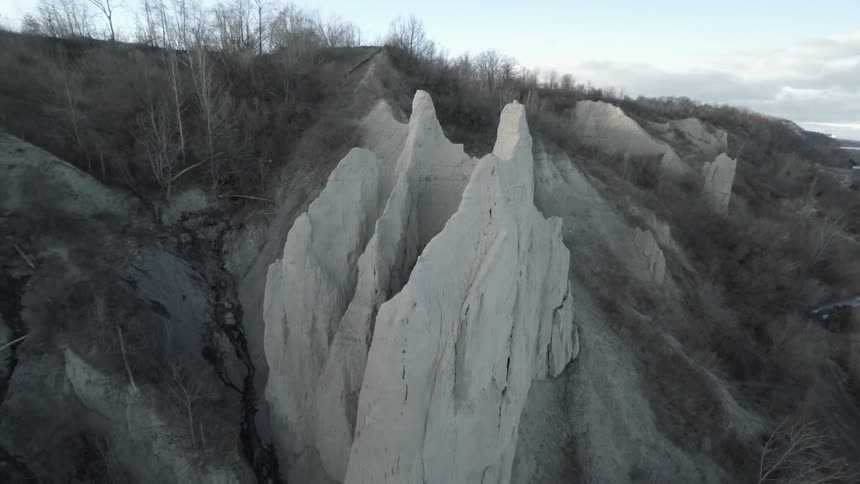 Large rocks and cliffs near water