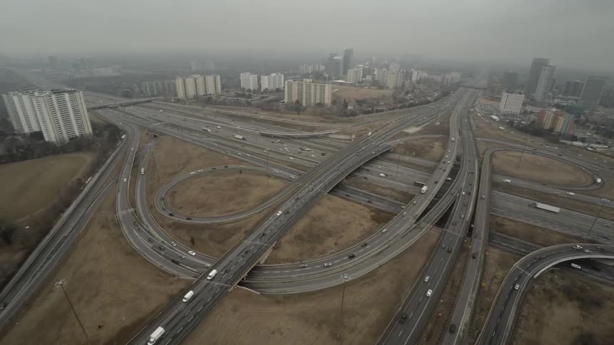 The interstate and its off ramps and on ramps are seen from above