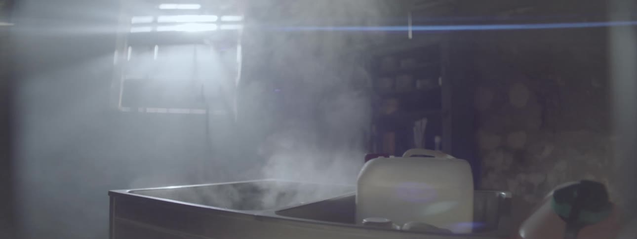 Steam rises from a pan of hot water